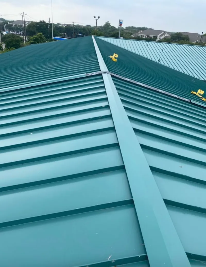 Green commercial metal roof ridge and valley for Metal Roof Repair in Gonzalez